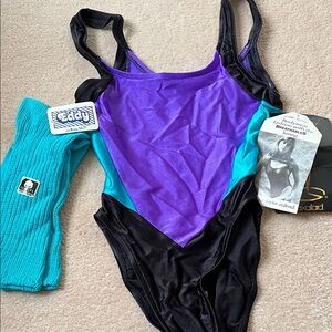 Purple and Black Bodywear fitness apparel with Turquoise Accents
